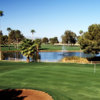 A view of a green guarded by a pond at Francisco Grande Resort & Golf Club.